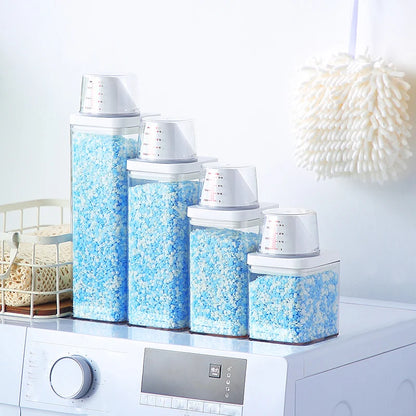 Bote para detergente en polvo con taza medidora